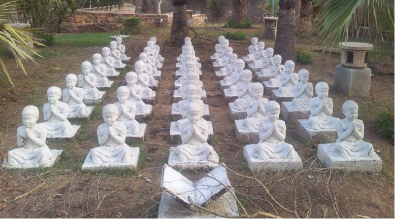 Kids at School- A sculpture depicted within Garden of Five Senses